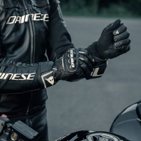 guy ready to gear up with motorcycle apparel